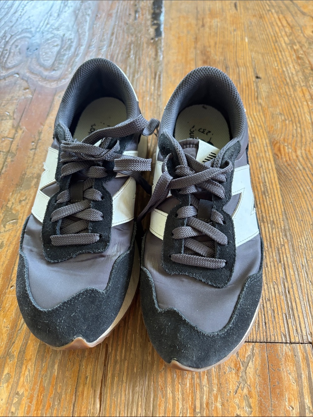 New Balance Women's 237 black and White Runner Sneakers